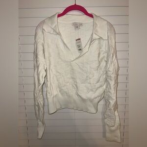 White collared sweater